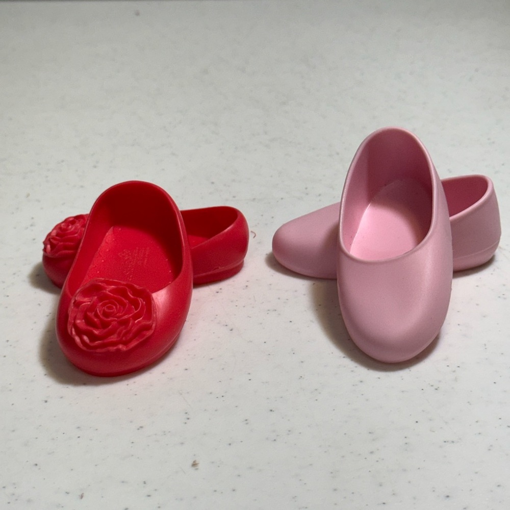Our generation 2 pairs of shoes for dolls